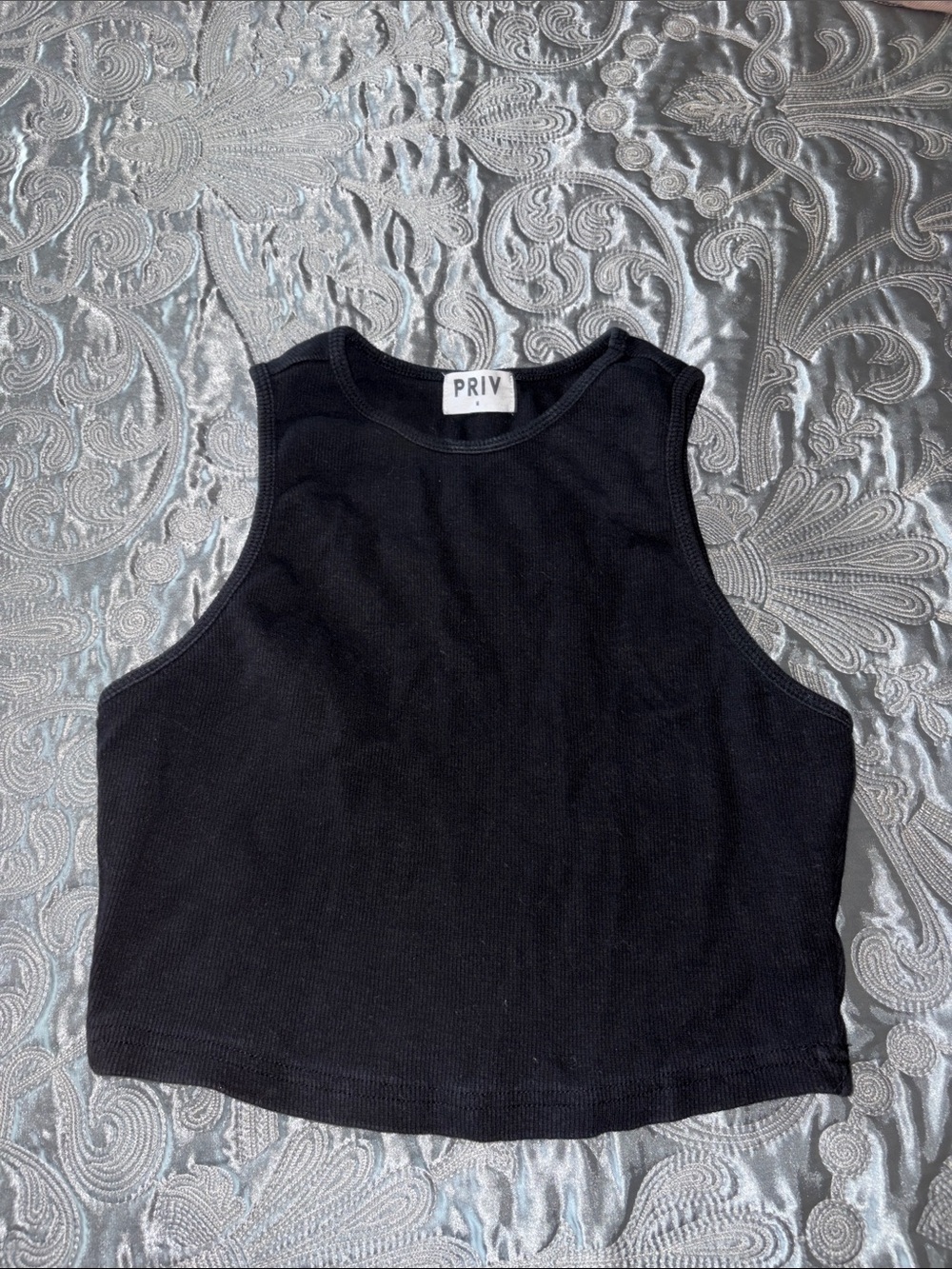 Black ribbed high neck sleeveless crop top